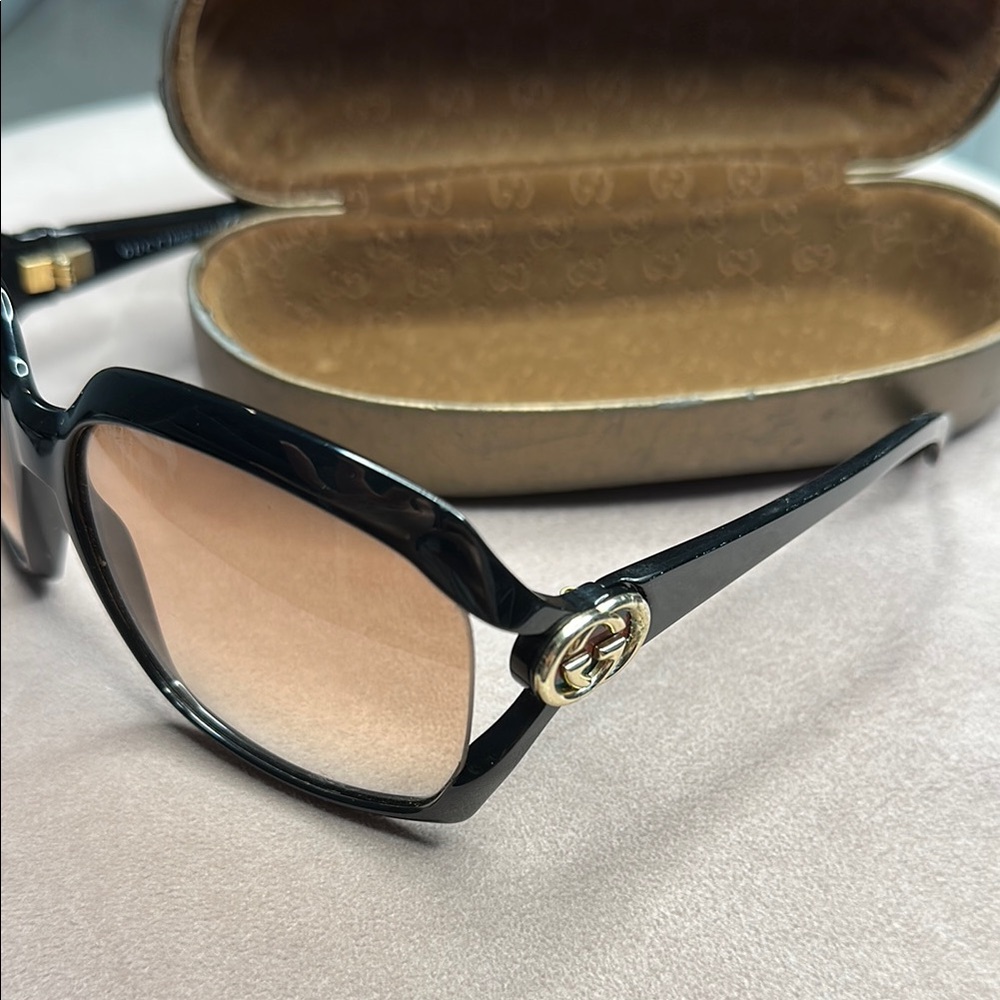 Gucci Black and Gold Sunglasses with Signature Logo